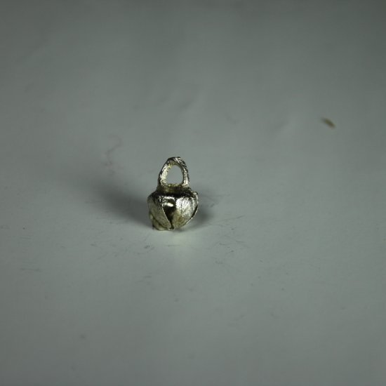 (Bild für) ganz kleine indische Kreuzschelle 10 mm - zum Schließen ins Bild klicken