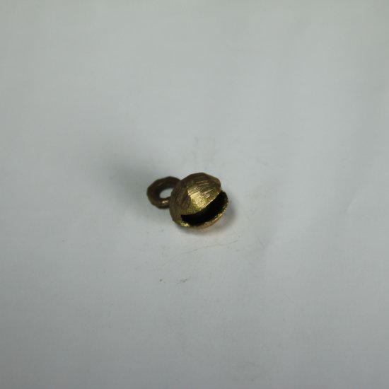 kleine indische Schelle oval 12 mm - zum Schließen ins Bild klicken