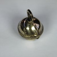 Kreuzschelle gold